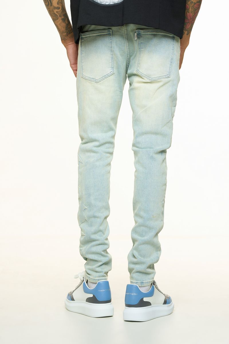 "LOVE IS PAIN" EMBOSSED SKINNY DENIM (LIGHT BLUE/SAND)