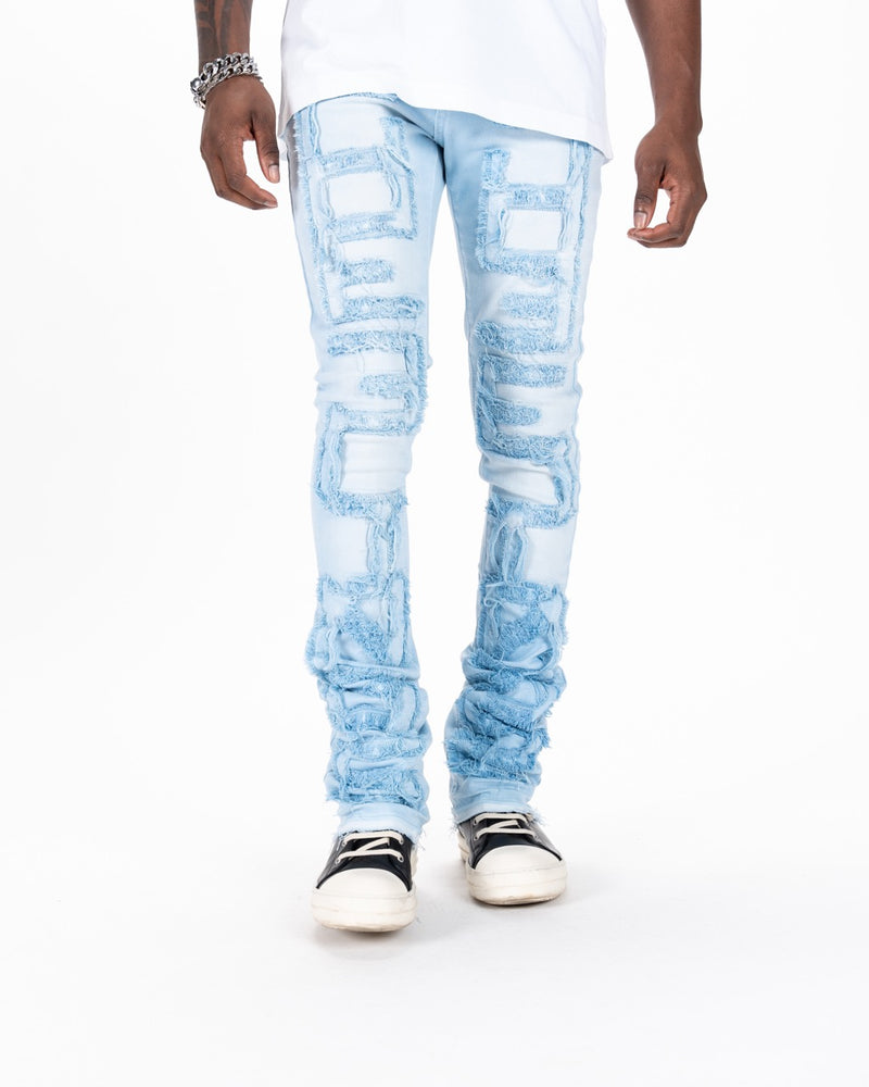 "INSPIRED BY" FLARE STACK DENIM