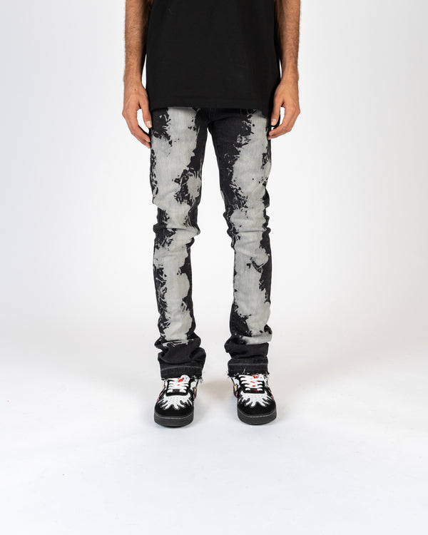 "SCARRED BY" FLARE STACK DENIM